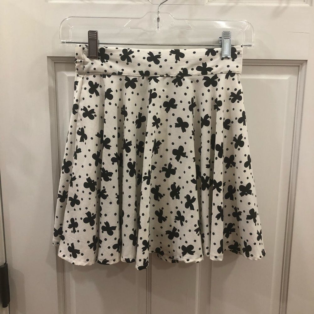 Delia’s white skirt with black bows & polka dots.